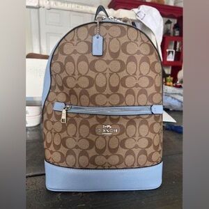 Baby blue / brown Coach backpack